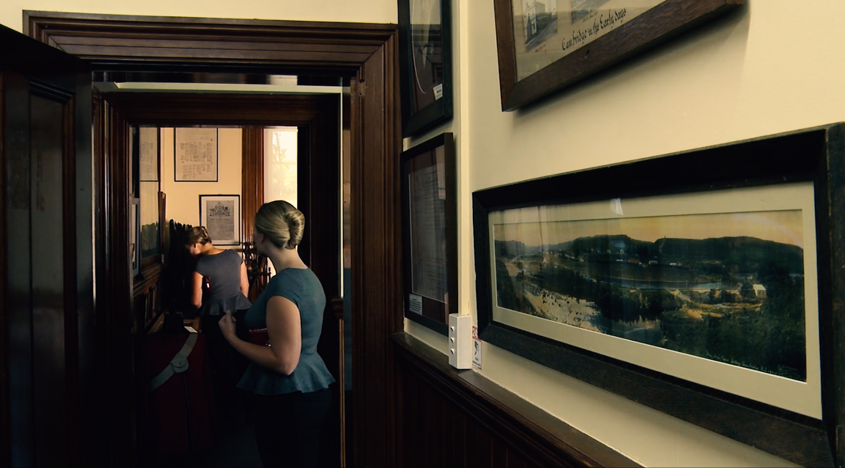 image of a woman viewing her double from a doorway